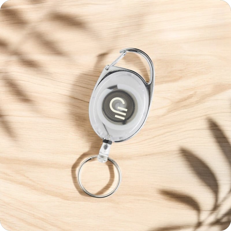 Porte-clés en plastique recyclé certifié avec cordon extensible Extense_00